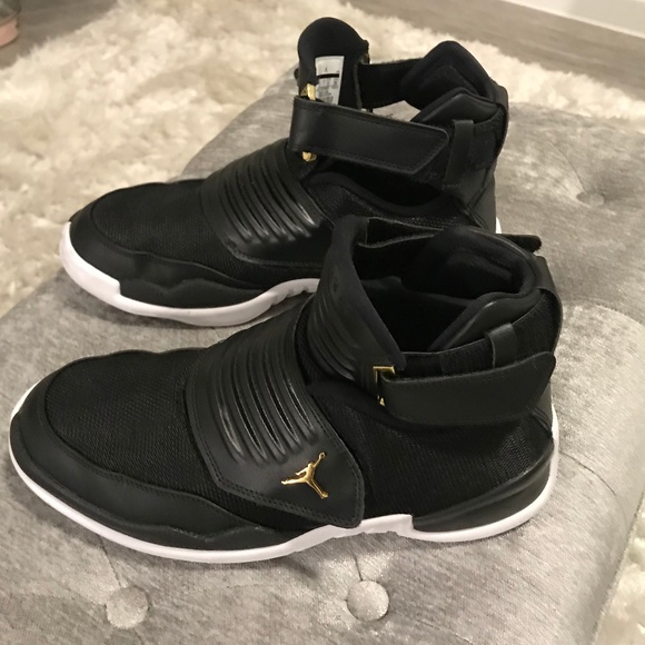 jordan generation 23 black and gold